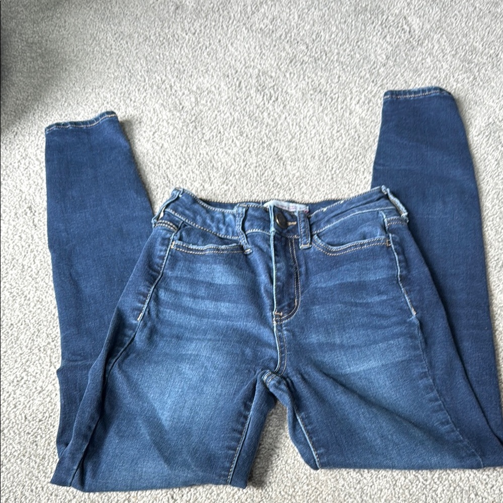 SO high rise begging Blue Jeans